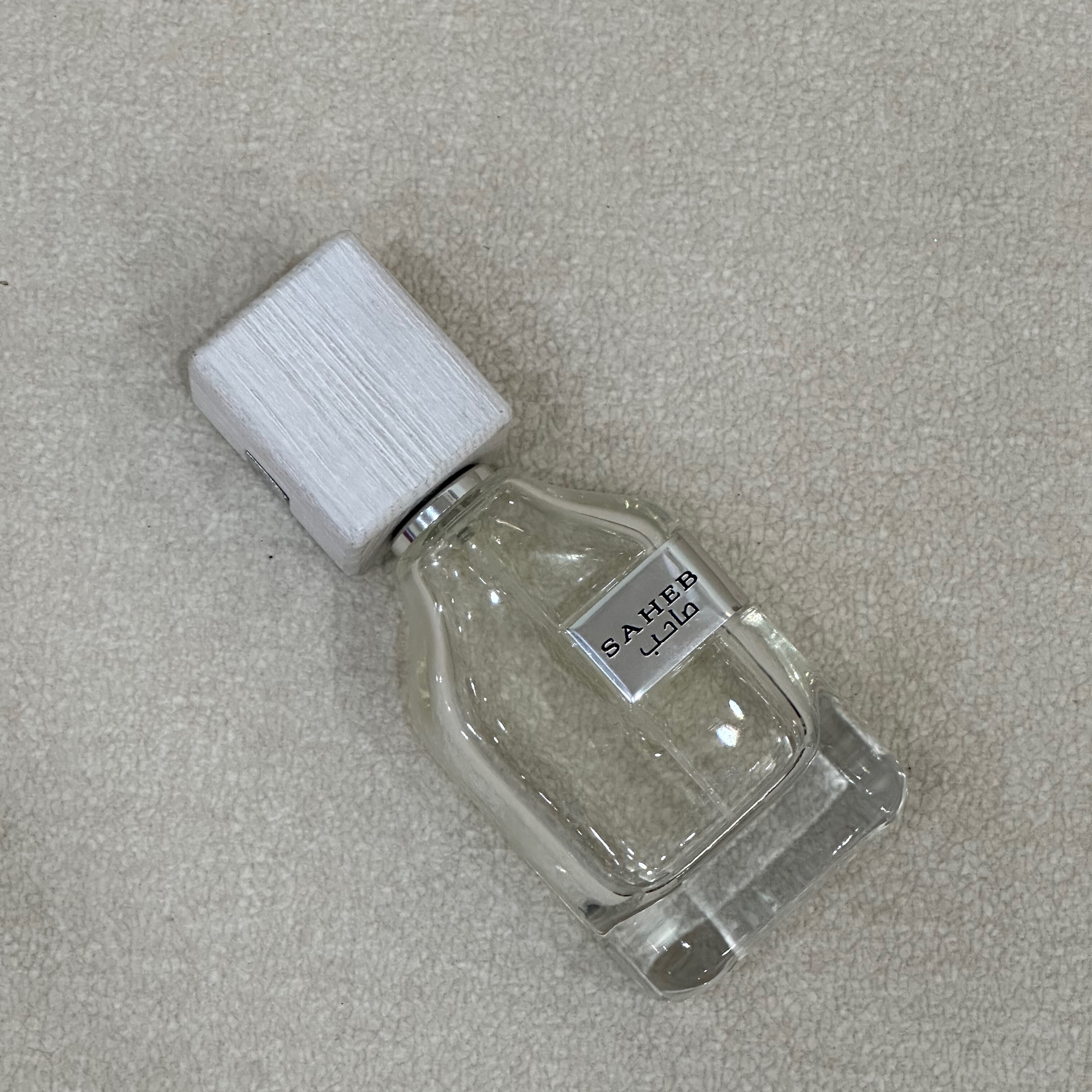 عطرادکلن صاحب سفید اینتنس ارض الزعفران